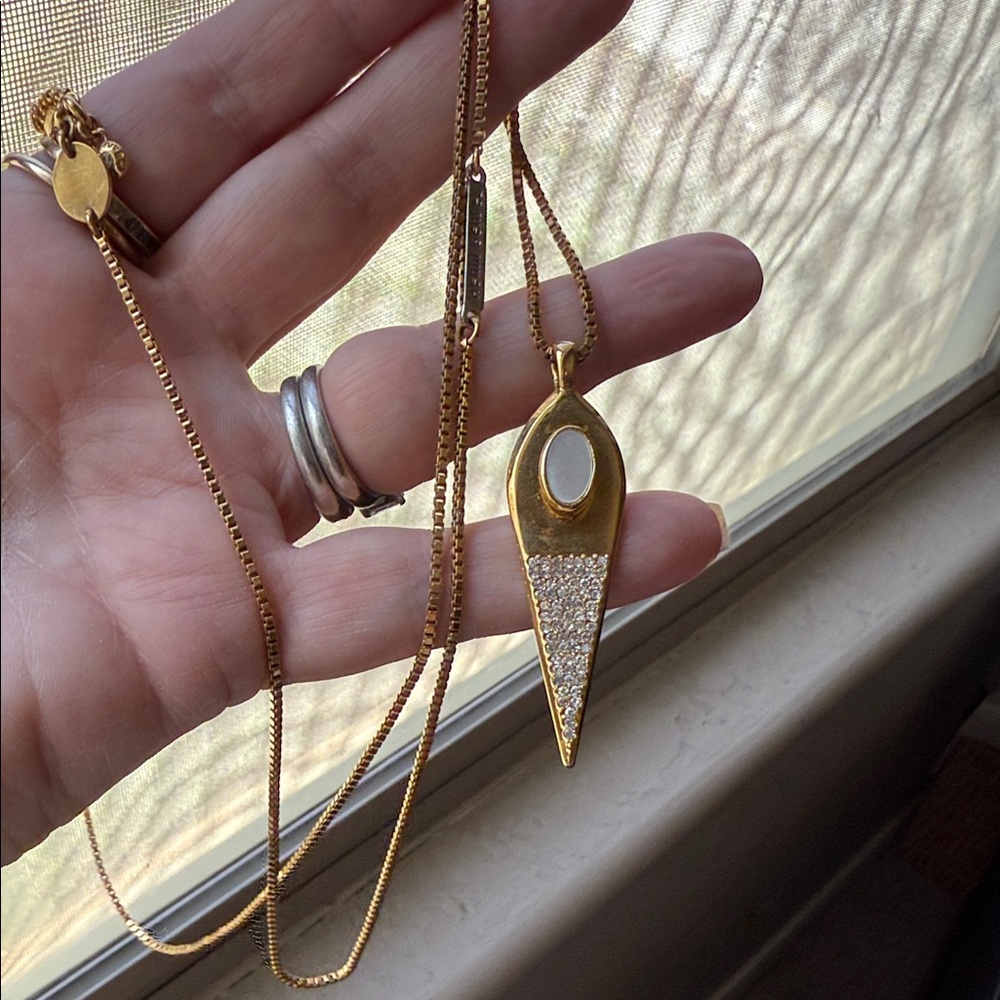Henri Bendel 38in long pave charm pendant